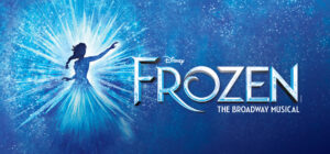 A Blue and Black silhouette of Elsa with her arm raised to the right pointing to the words Frozen the Broadway Musical on a dark blue background